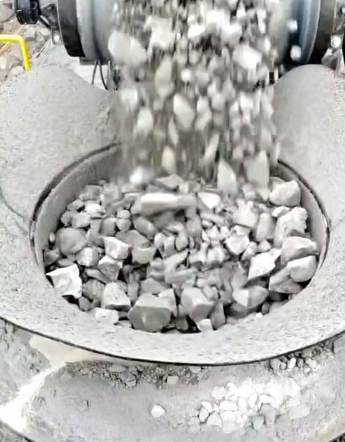 Granite quarry operation in Phang Nga Province Thailand showing muddy feed material during monsoon season