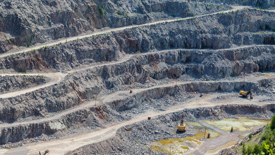 At a granite quarry site, granite is one of the most commonly used raw materials for infrastructure production in the construction industry.